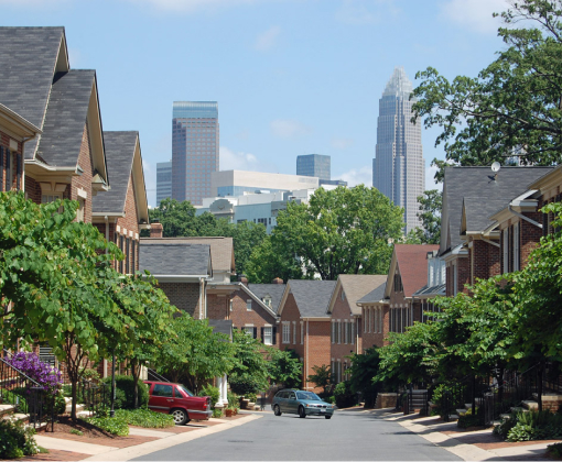 Historic houses on tree-lined streets in Dilworth, a desirable Charlotte NC neighborhood.